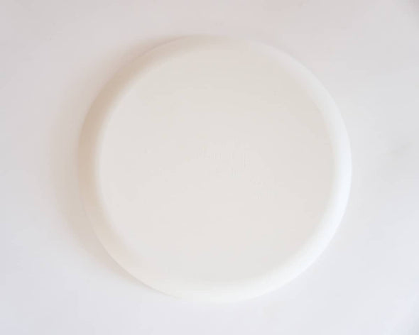 Assiette en porcelaine beige rose motifs blancs 1